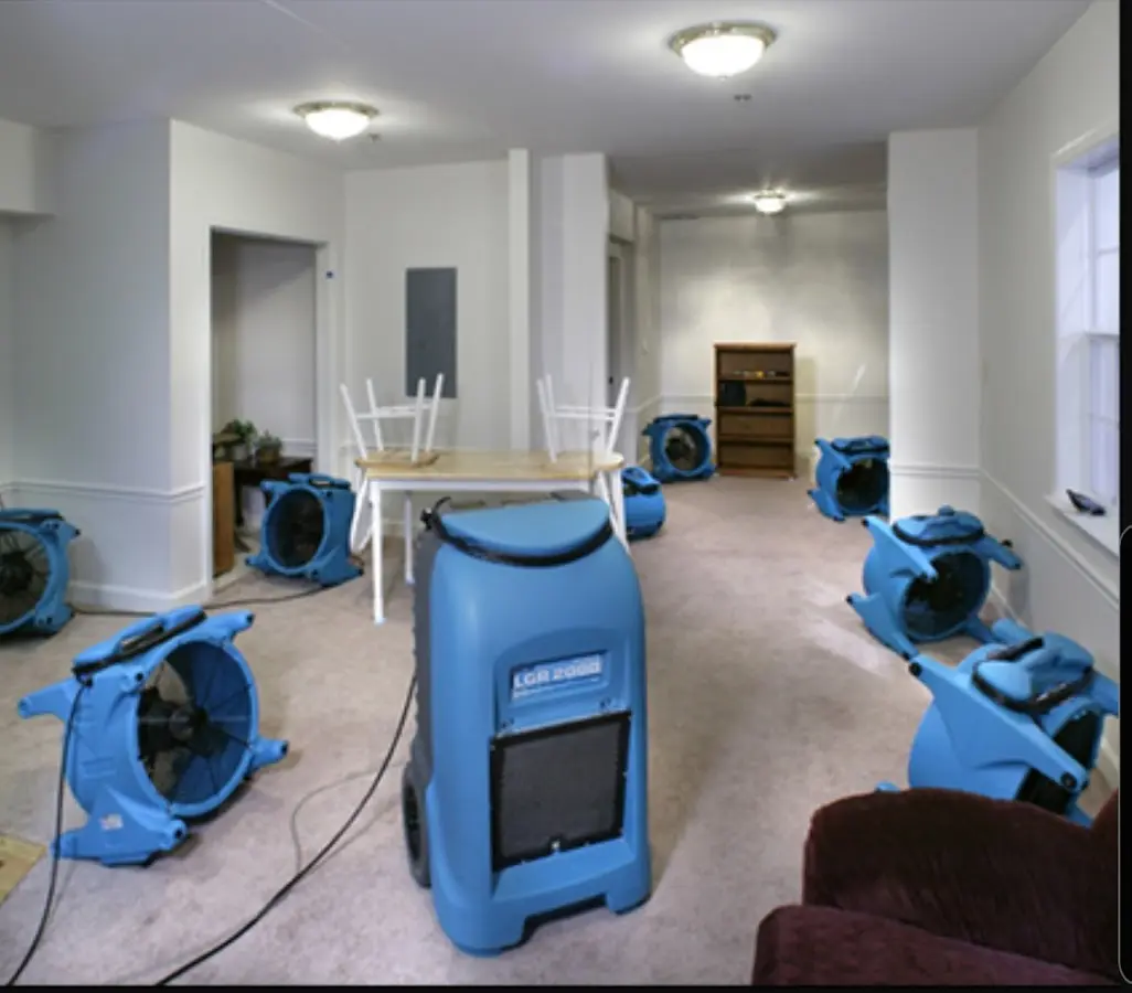 Air movers and dehumidifier setup for Water Damage Restoration in Anamosa